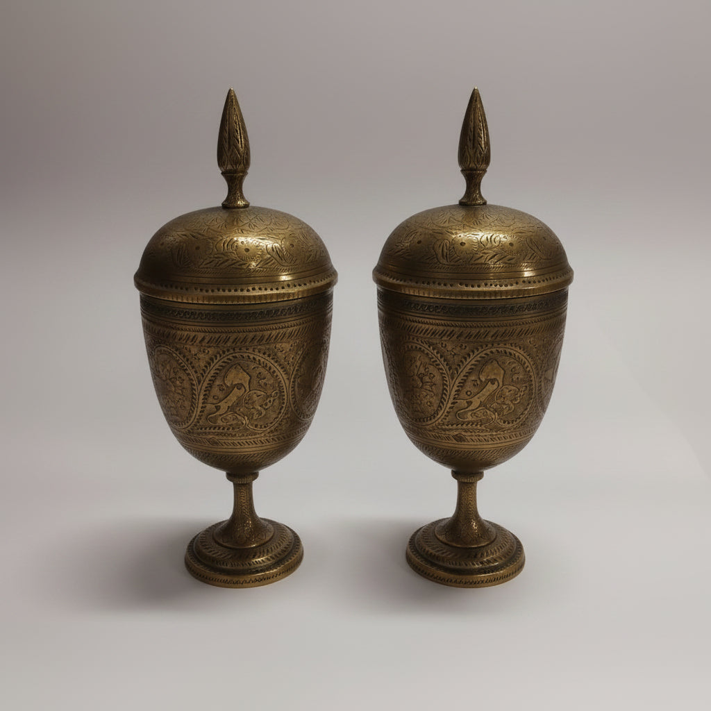 Pair of Chased Engraved Lidded Urns