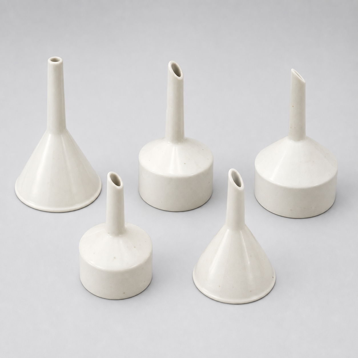 Collection of 5 Ceramic Funnels
