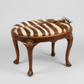 Late 19th Century English Carved Mahogany Bench with Shell Knee, Spade Foot, and Zebra Upholstery