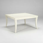 Milo Cocktail Table in Weathered White with a Maple Veneer Top